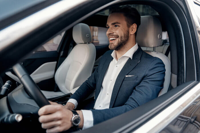 Business-Man-Driving-700x467 (1)
